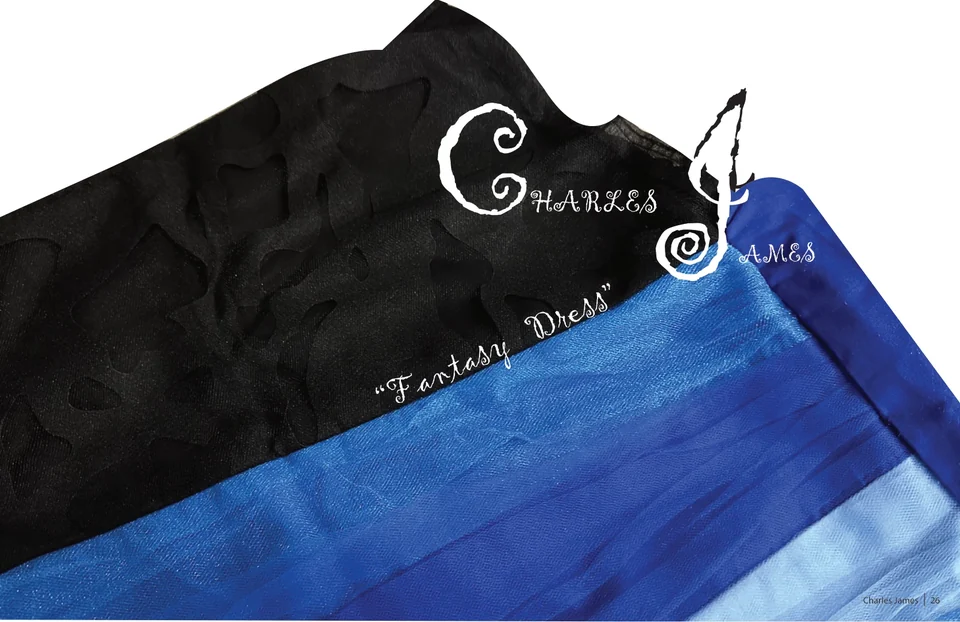 Black and layered royal-blue fabric arranged as a title graphic for the Fantasy Dress project.